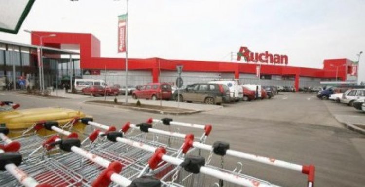 Auchan este interesat de Carrefour şi Real